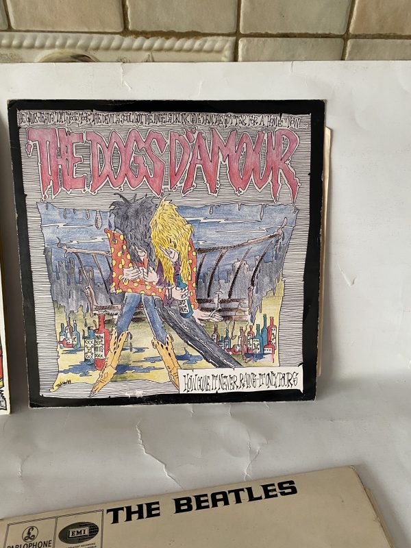 The Dogs D’Amour  :- How come it never rains but it pours 12”